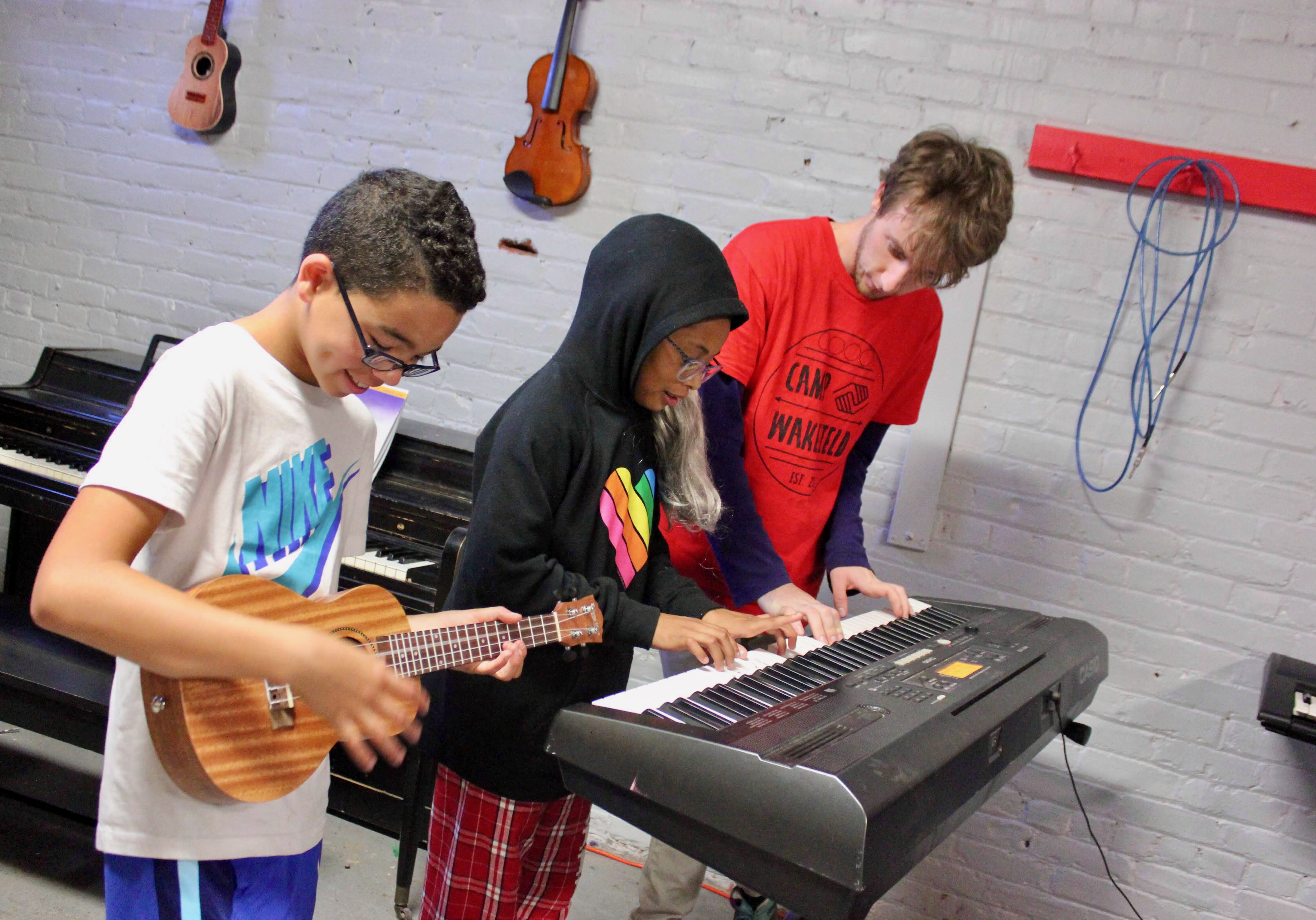 Boys playing music